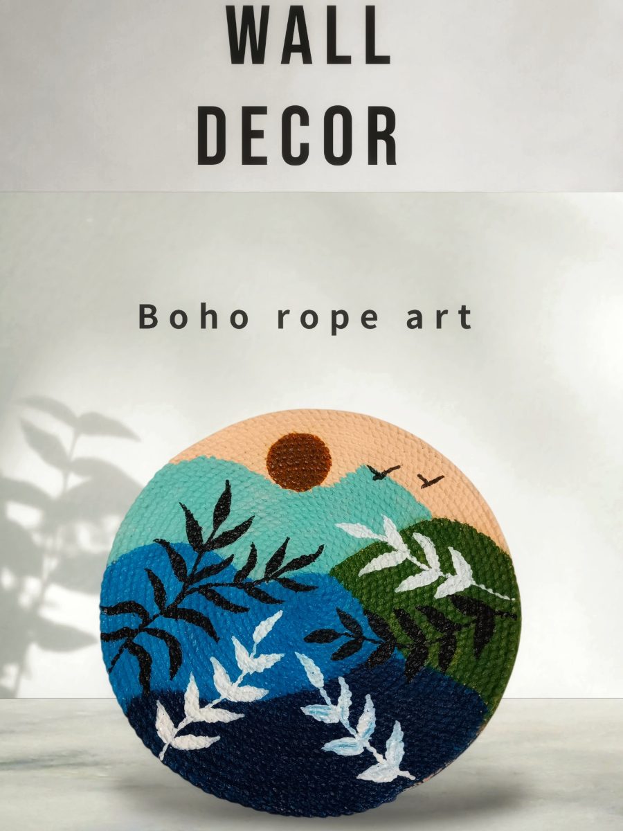 Add a touch of nature to your walls.This circular rope decor features hand-painted mountains sunset.Lightweight,textured and 100% handmade.  Material- cotton rope,acrylic paint   Style- Boho,Nature-inspired.  Best for- Living room,bedroom, home entry or g
